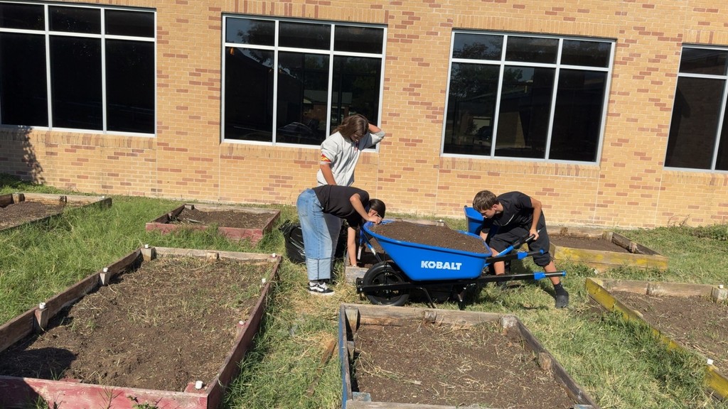 Students working on the gardens