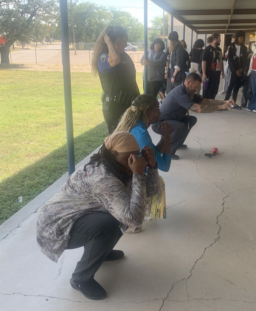 Students and Staff in squat challenge