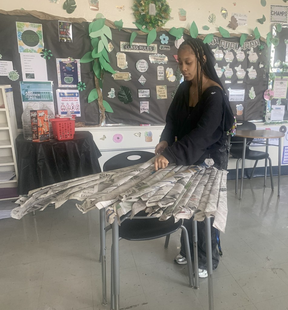 Crossroads Students working on recycled fashion projects.