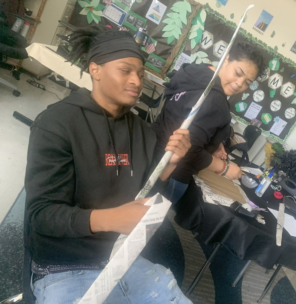 Crossroads Students working on recycled fashion projects.
