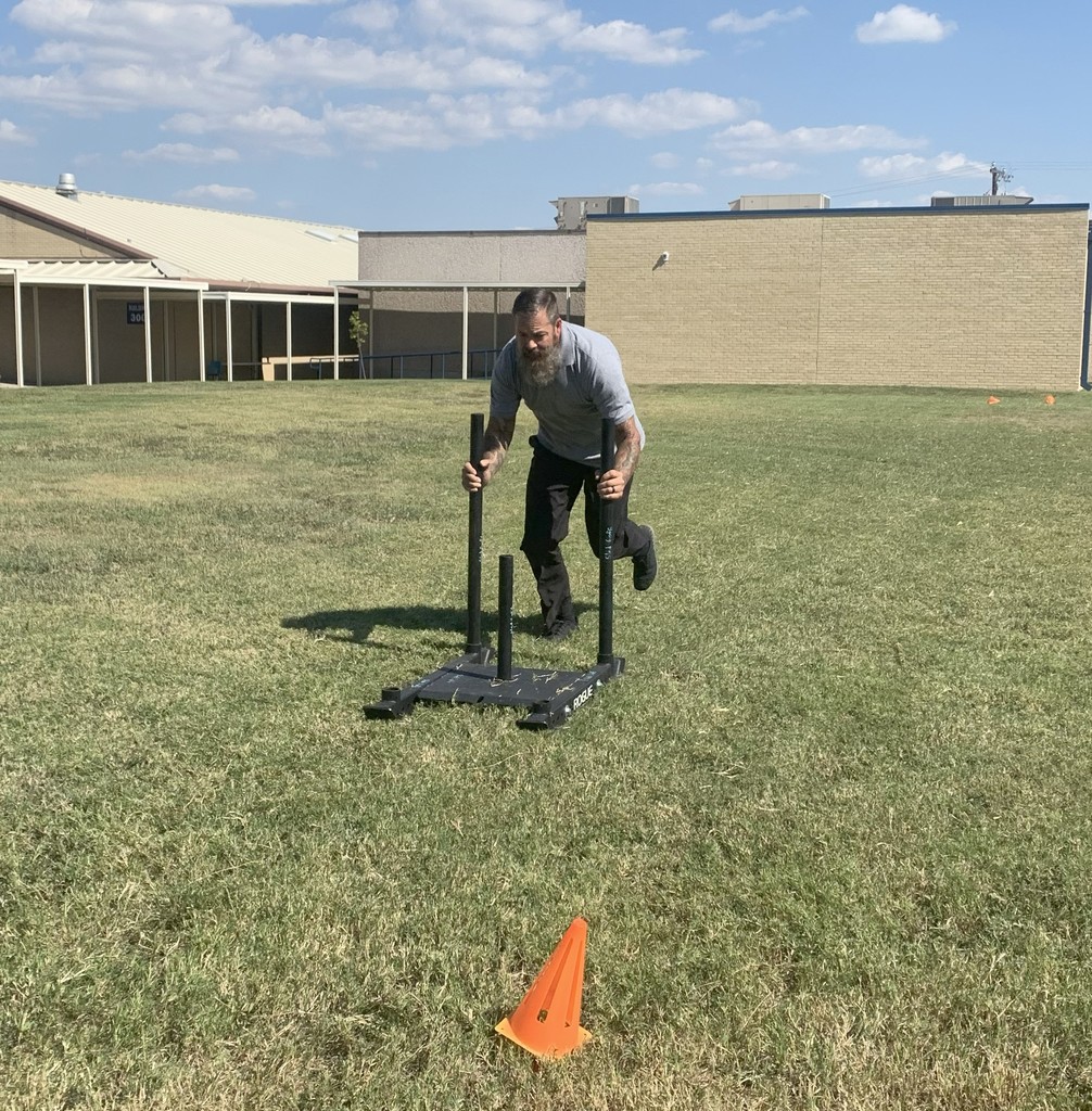 Mr Brown doing sled push