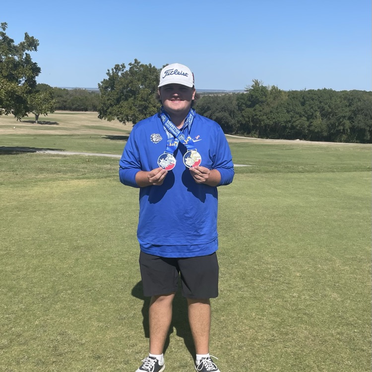 golfer with medals