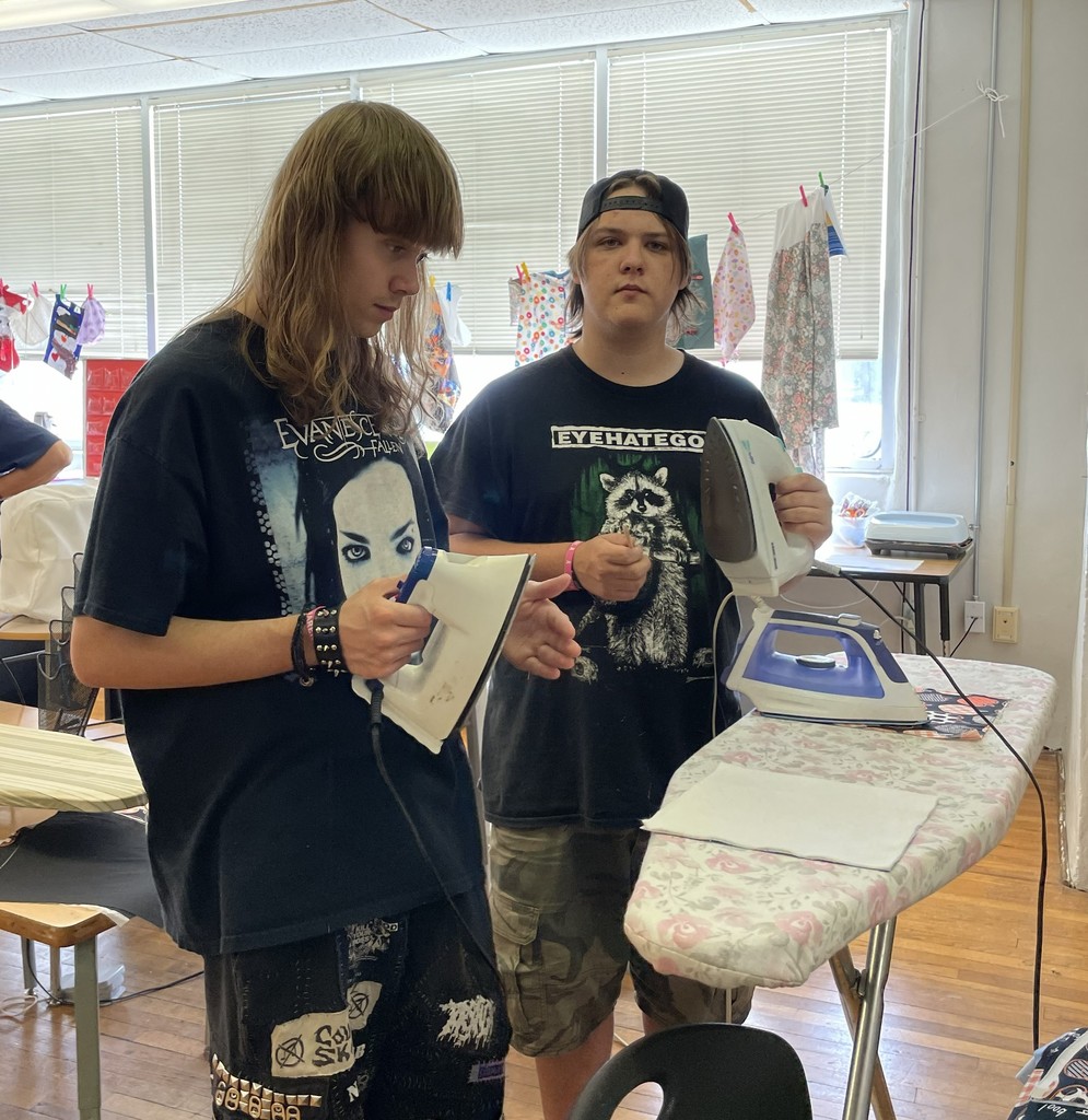 Picture of Colton and Jordan working