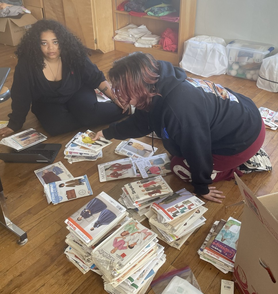 Picture of Avery and Antara sorting donations