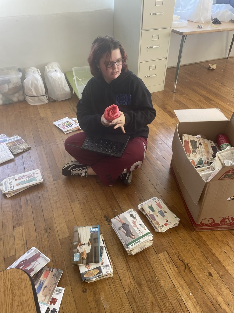 Picture of Avery sorting donations