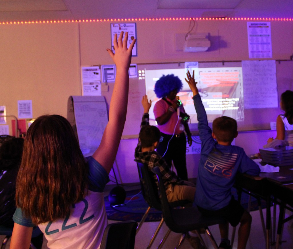 Students raise hands to be called on next