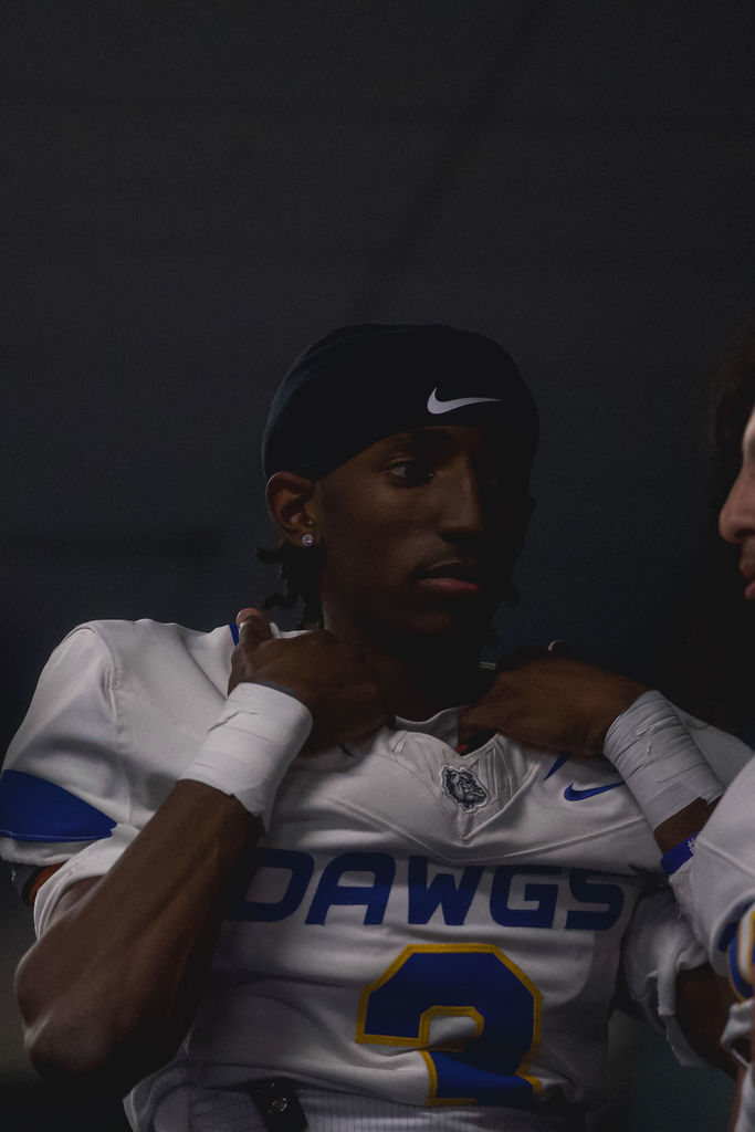 Copperas Cove High School football athletes playing a game against De Soto.