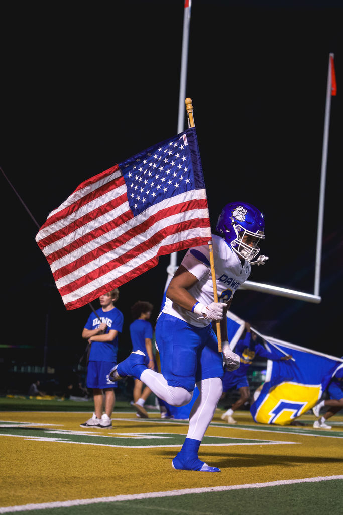 Copperas Cove High School football athletes playing a game against De Soto.