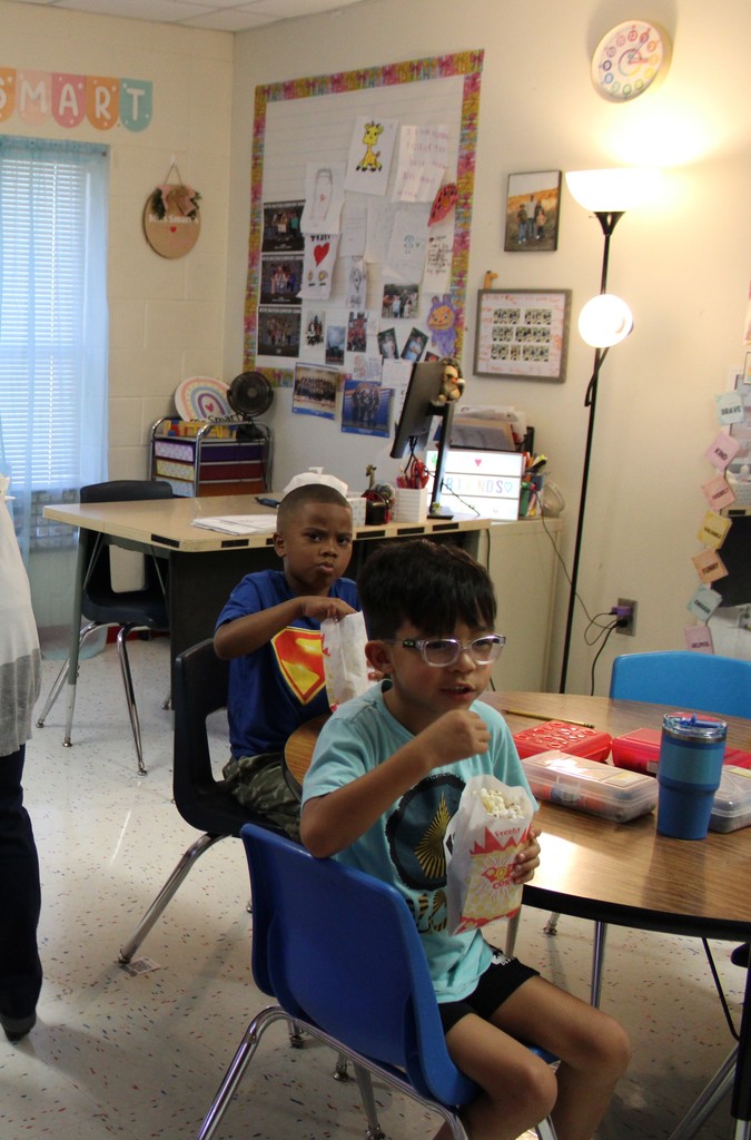 Students enjoying popcorn