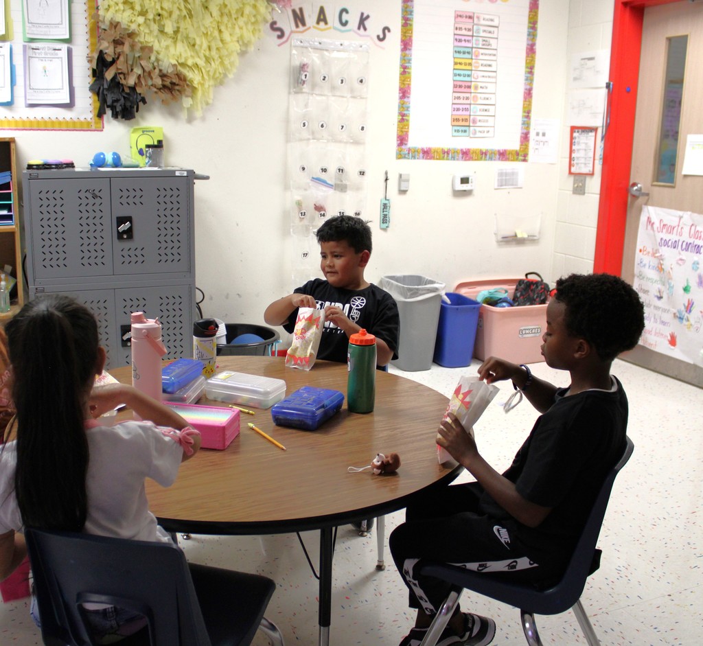 Students enjoying popcorn