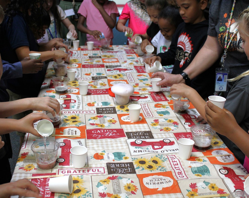 Students pour in last ingredient and their potions explode