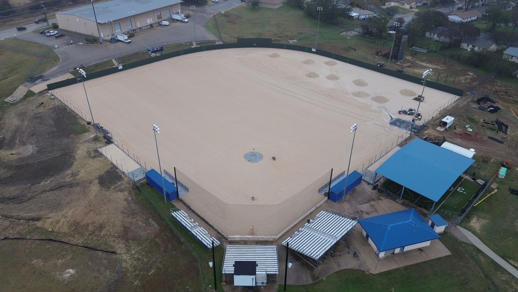 Photo of a baseball field being worked on
