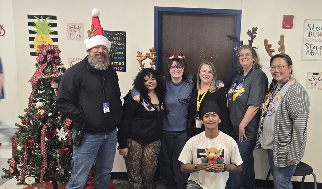 Picture of staff and students wearing antlers