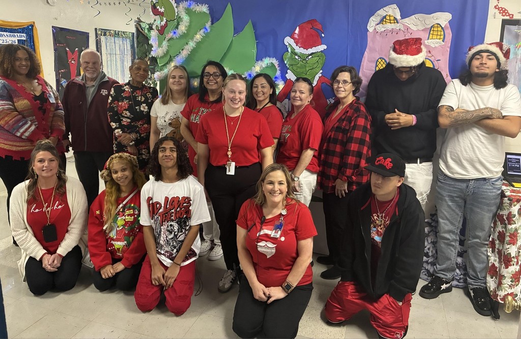 2-story staff and students in red