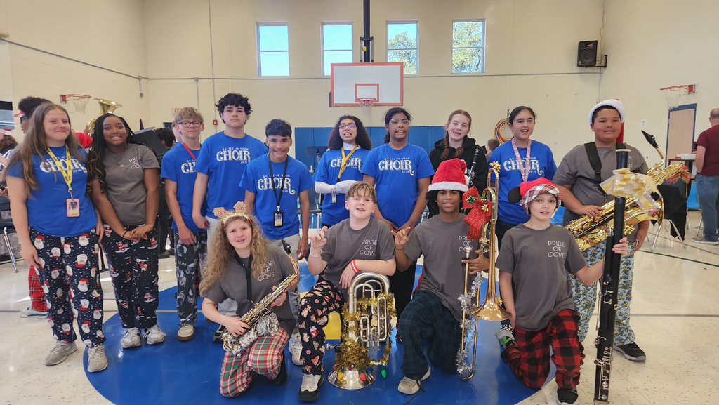 Former Halstead students from band and choir pose together