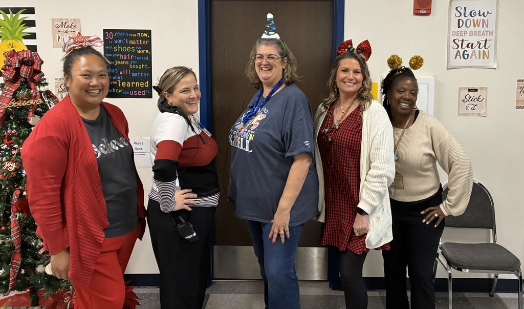 Students and Staff showing their Tree toppers
