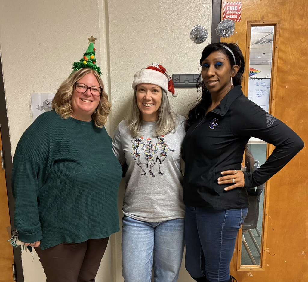 Students and Staff showing their Tree toppers