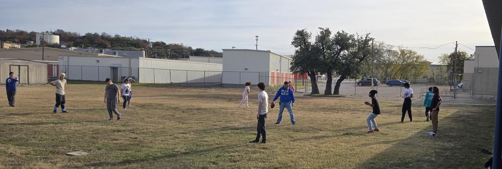 Mr Brown and students practicing for Turkey Bowl