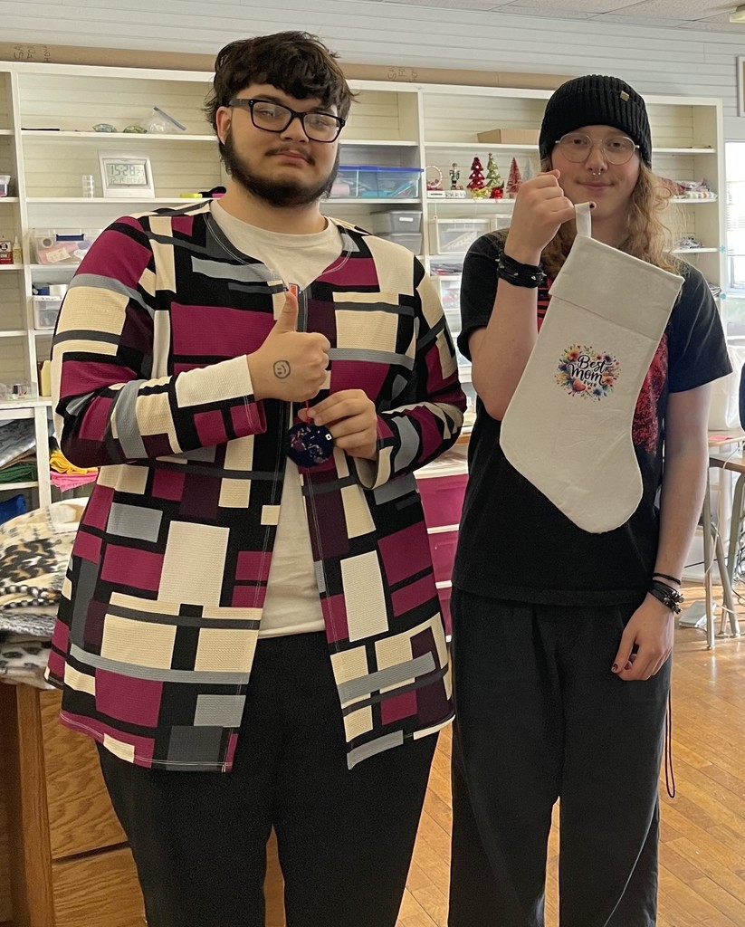 Students in Sewing club working on projects