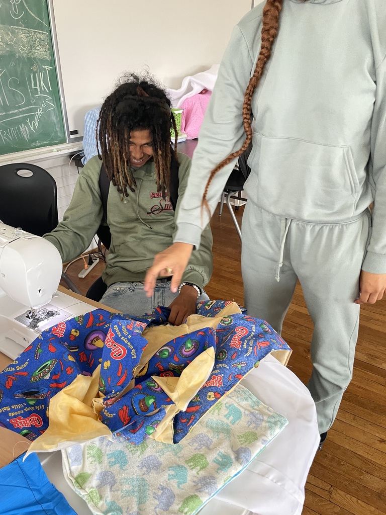 Students in Sewing club working on projects