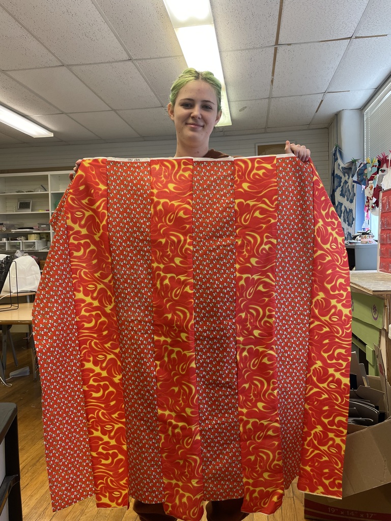 Students in Sewing club working on projects