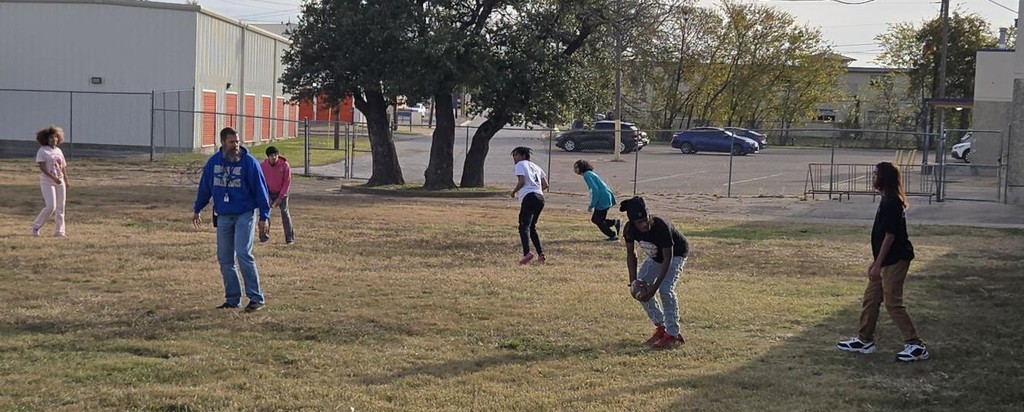 Crossroad students practicing for turkey bowl