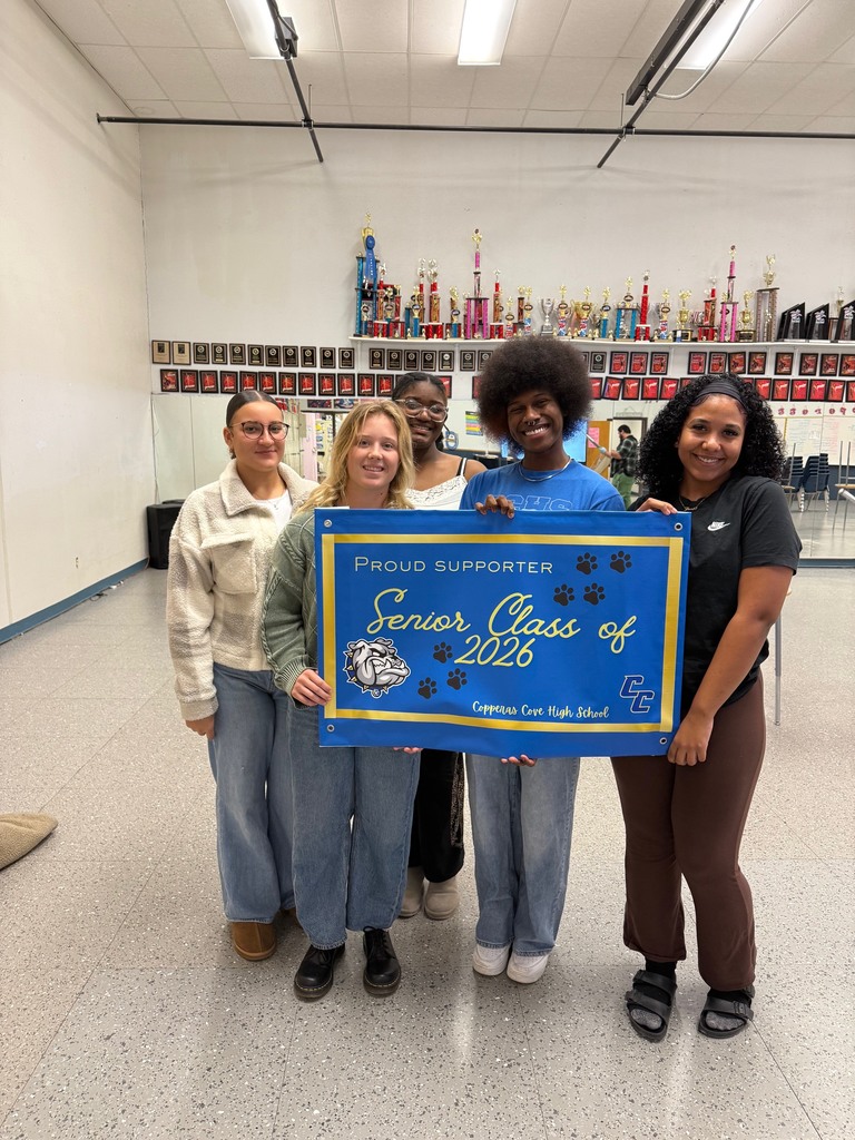Students presenting a banner that reads: "Proud Supporter of the Senior Class of 2026 - Copperas Cove High School"