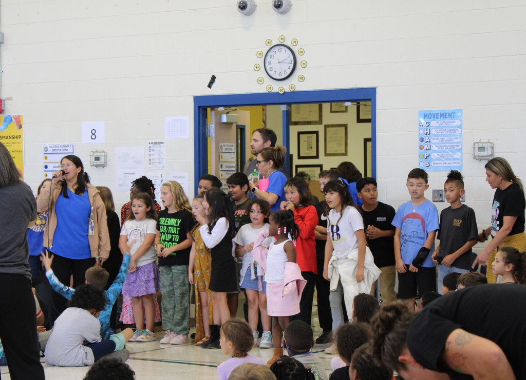 Student council performs a song they wrote 