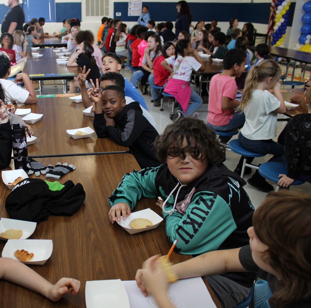 Students pose with treats