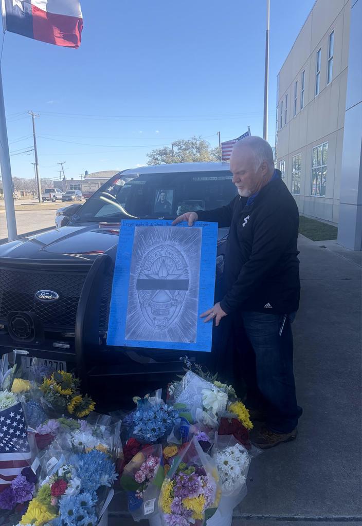 Poster signed by Crossroads Students in memorial for Officer Garretson