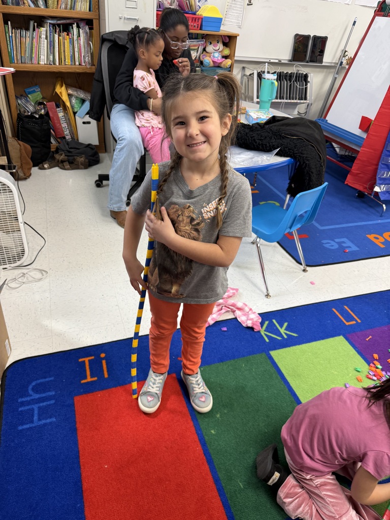 Students making AABB patterns