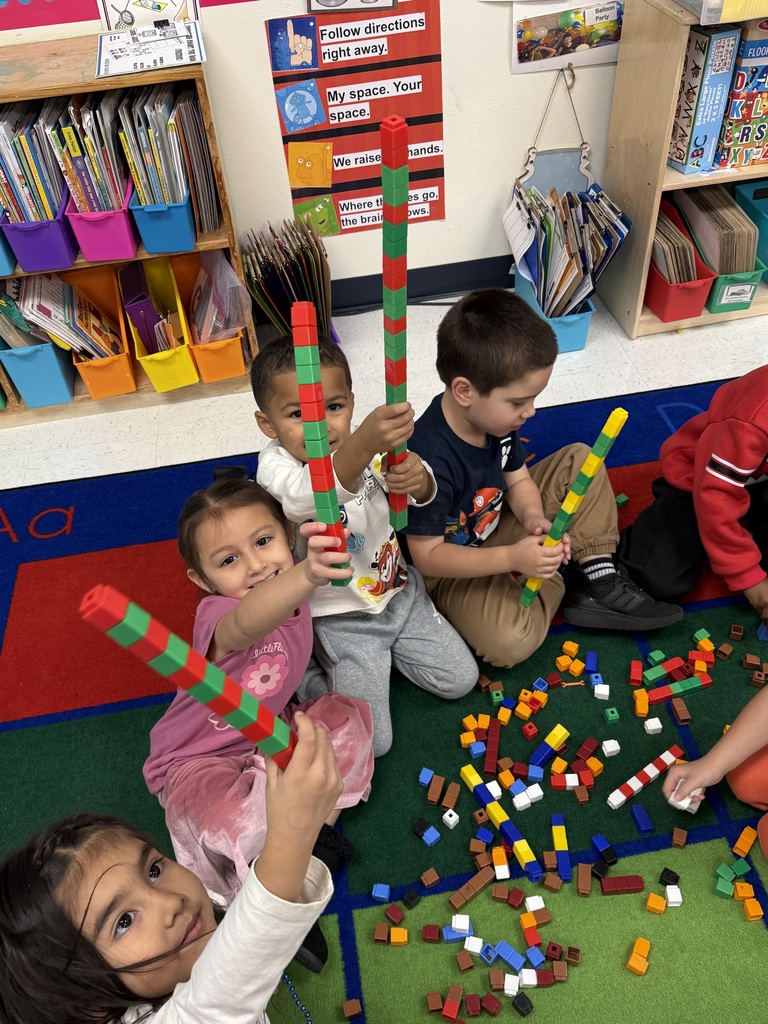 Students making AABB patterns