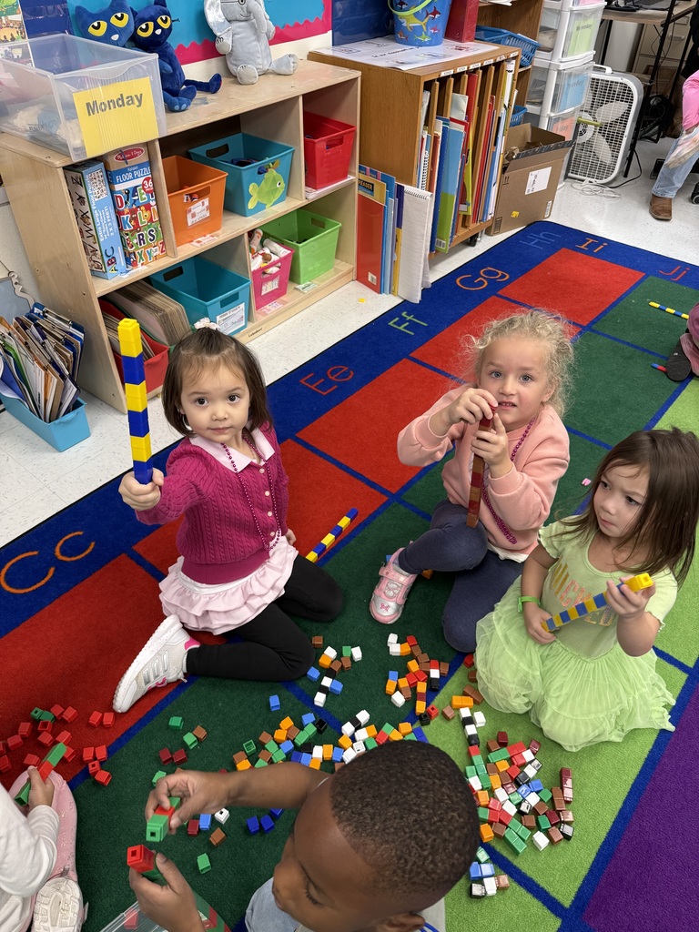 Students making AABB patterns