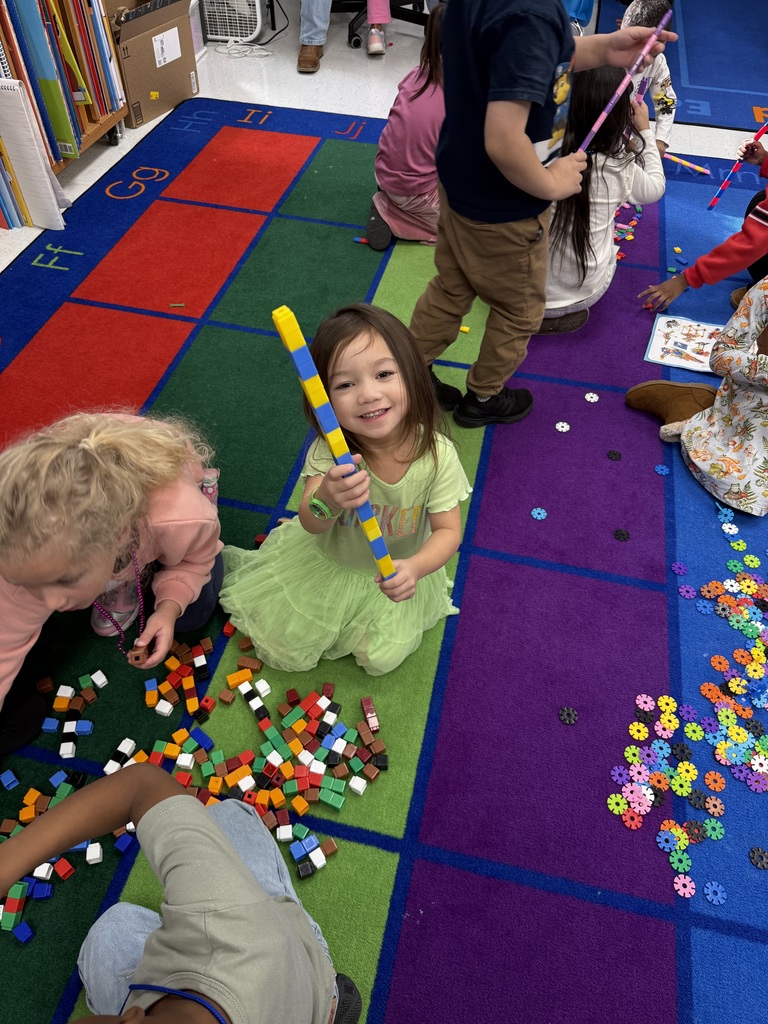 Students making AABB patterns