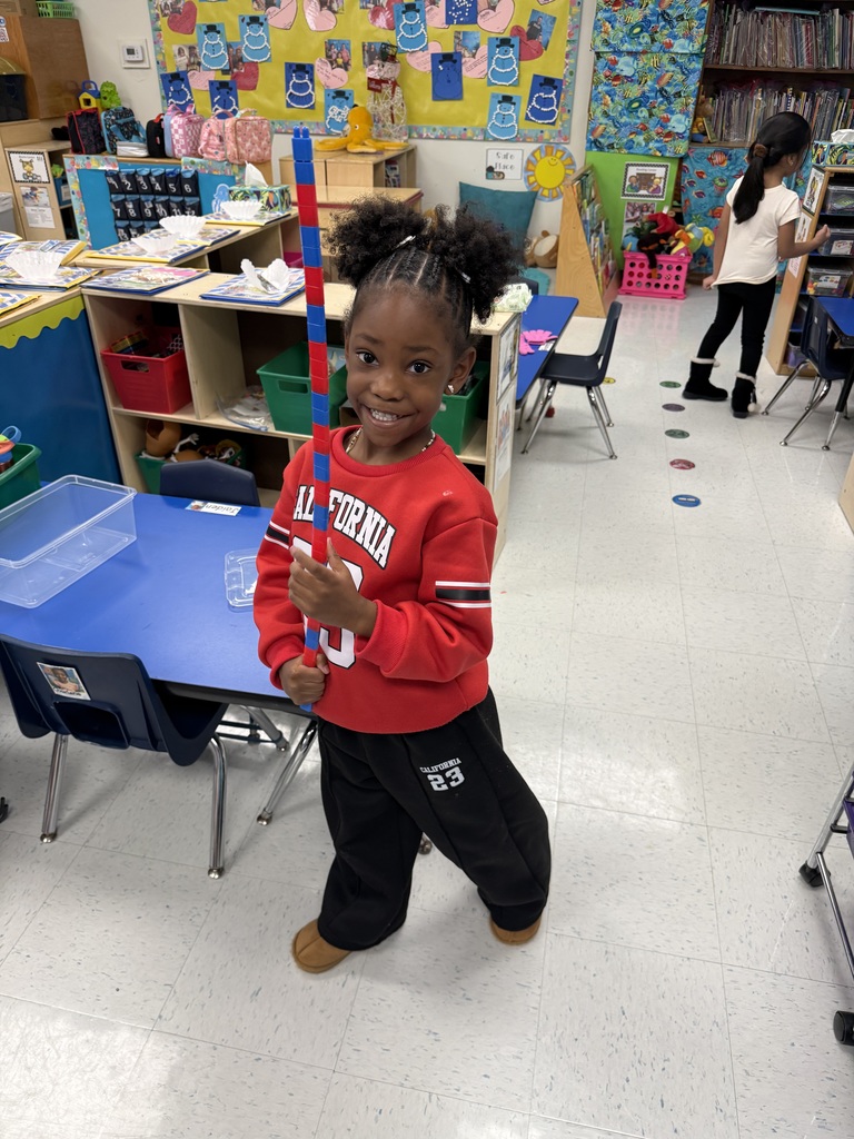 Students making AABB patterns