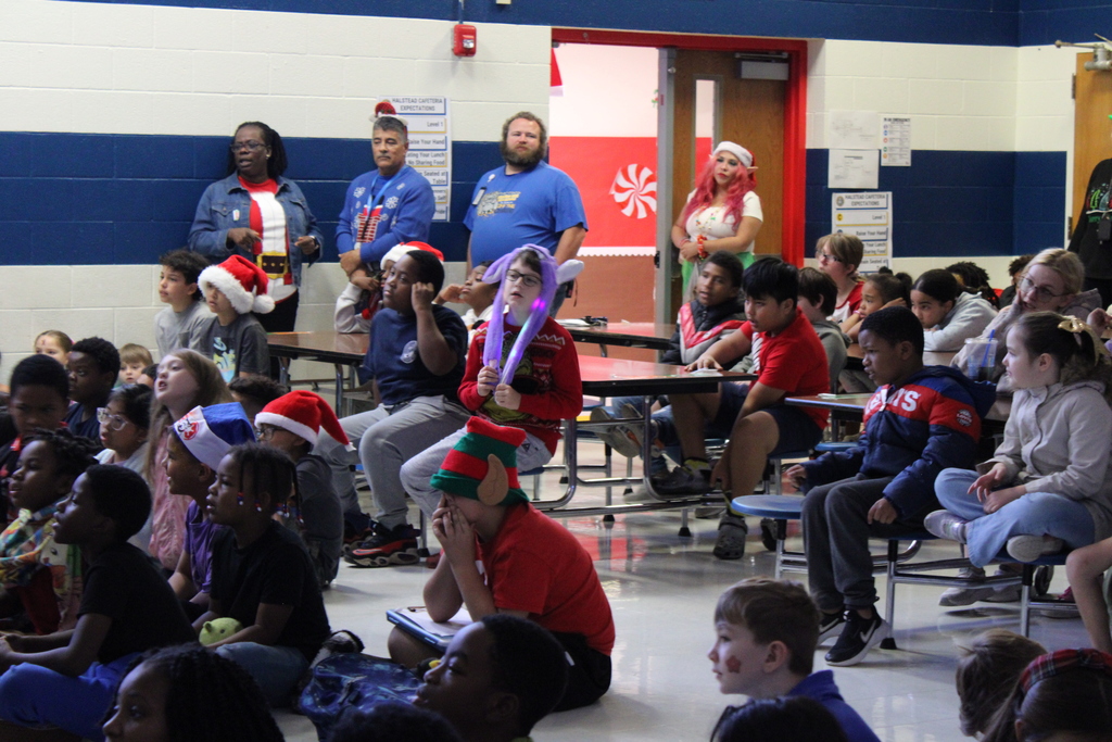 Students singing in cafeteria