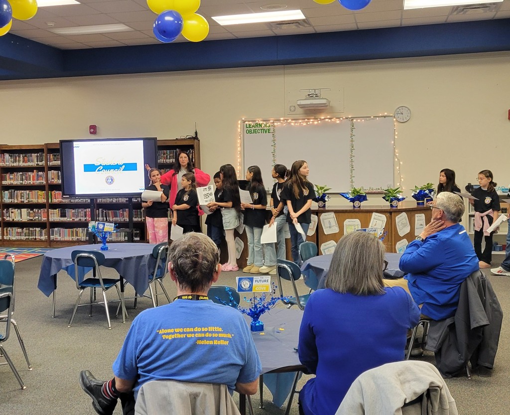 Student council presents slideshow for school board members