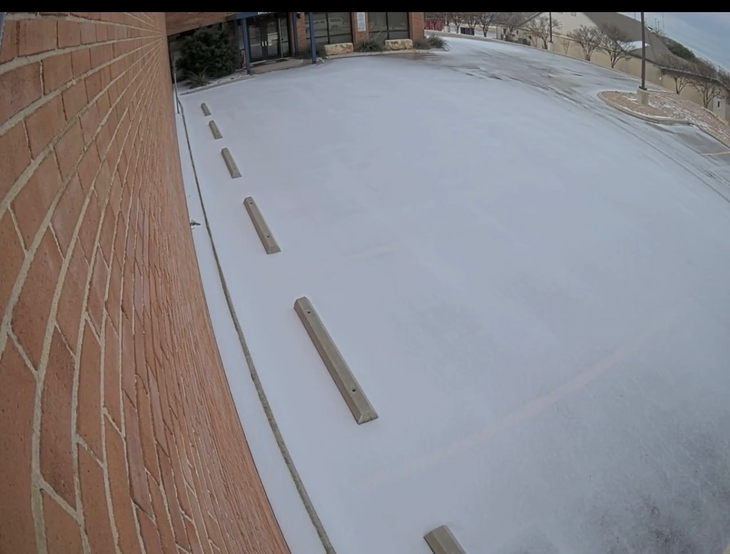Photo of a parking lot covered in ice