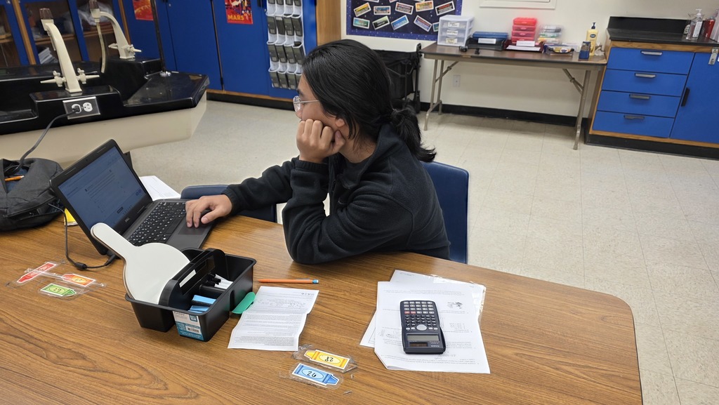 A student working on Science-related materials.