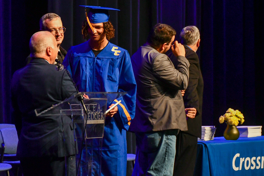 Student shaking hands with principal during graduation