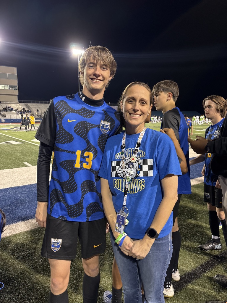 soccer player with teacher