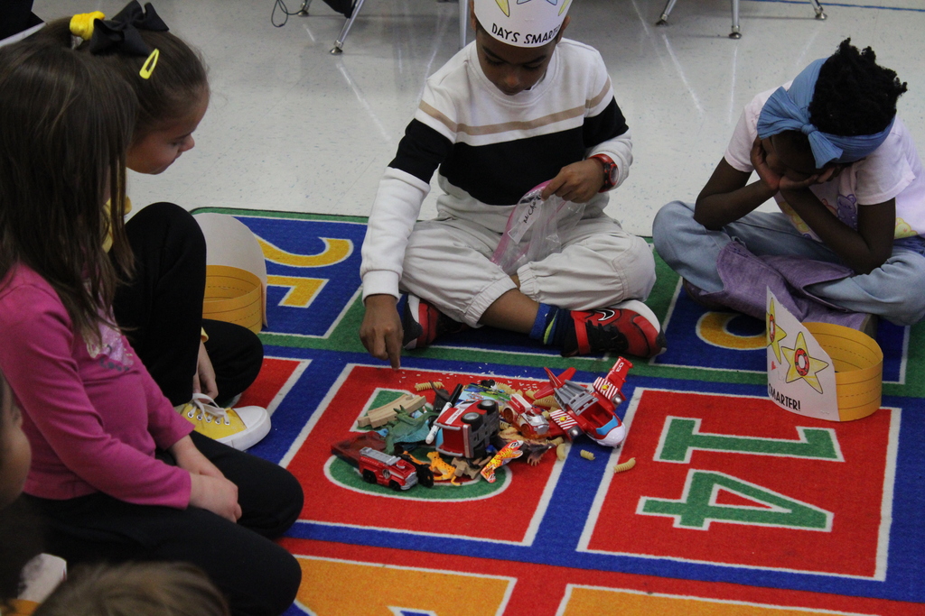 Students counting their 100 items