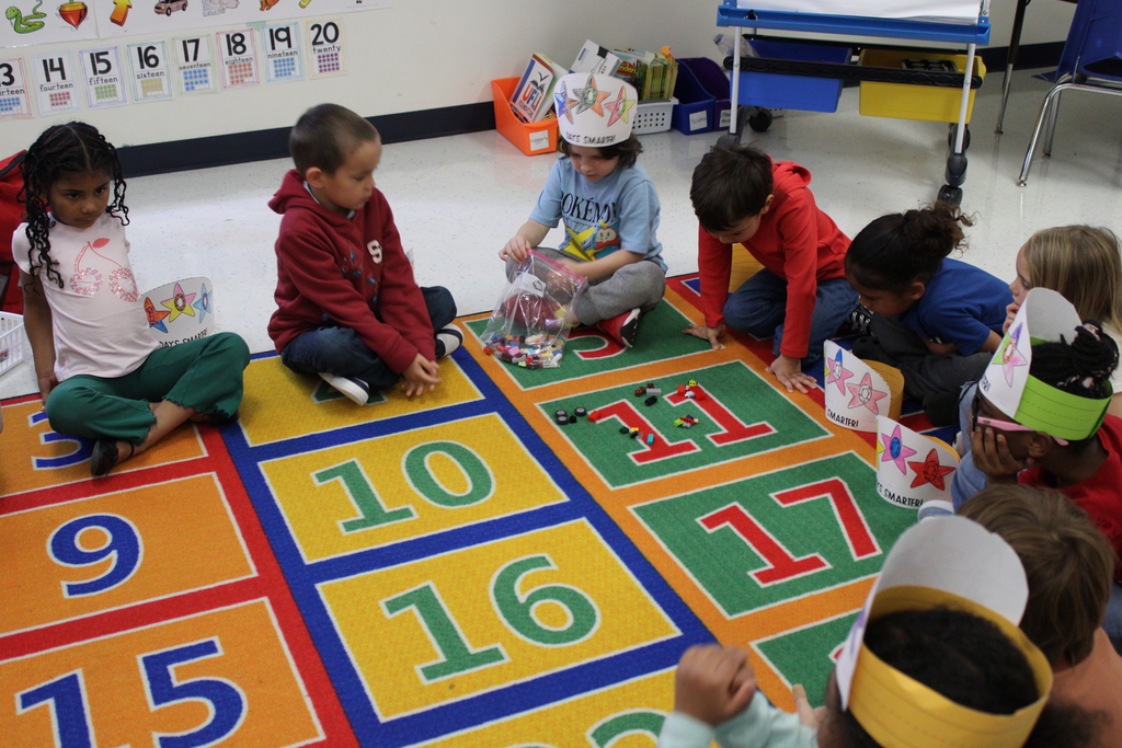 Students counting their 100 items