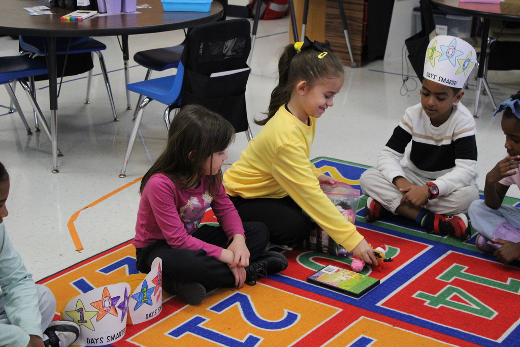 Students counting their 100 items