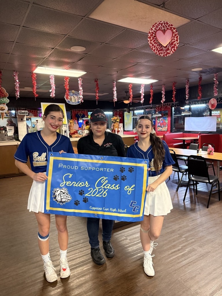 Copperas Cove High School Seniors presenting a banner to restaurant workers of Black Meg 43