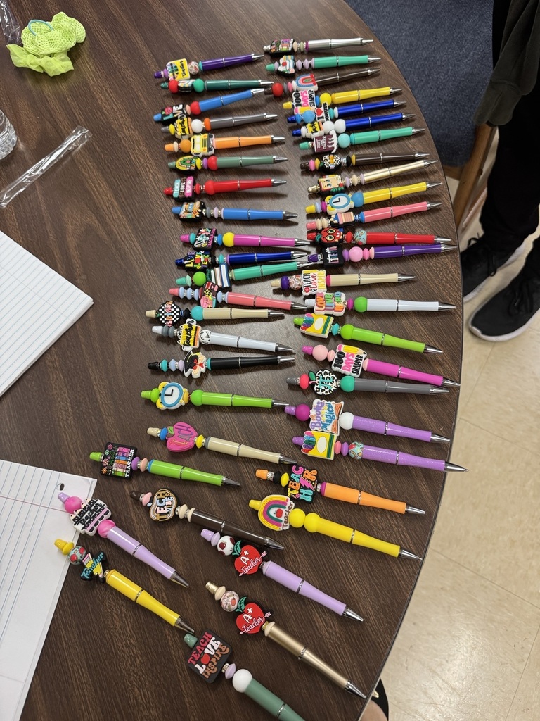 Students prepping and preparing pens to give away to teachers for TEACHER APPRECIATION WEEK