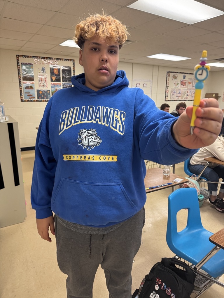 Students prepping and preparing pens to give away to teachers for TEACHER APPRECIATION WEEK