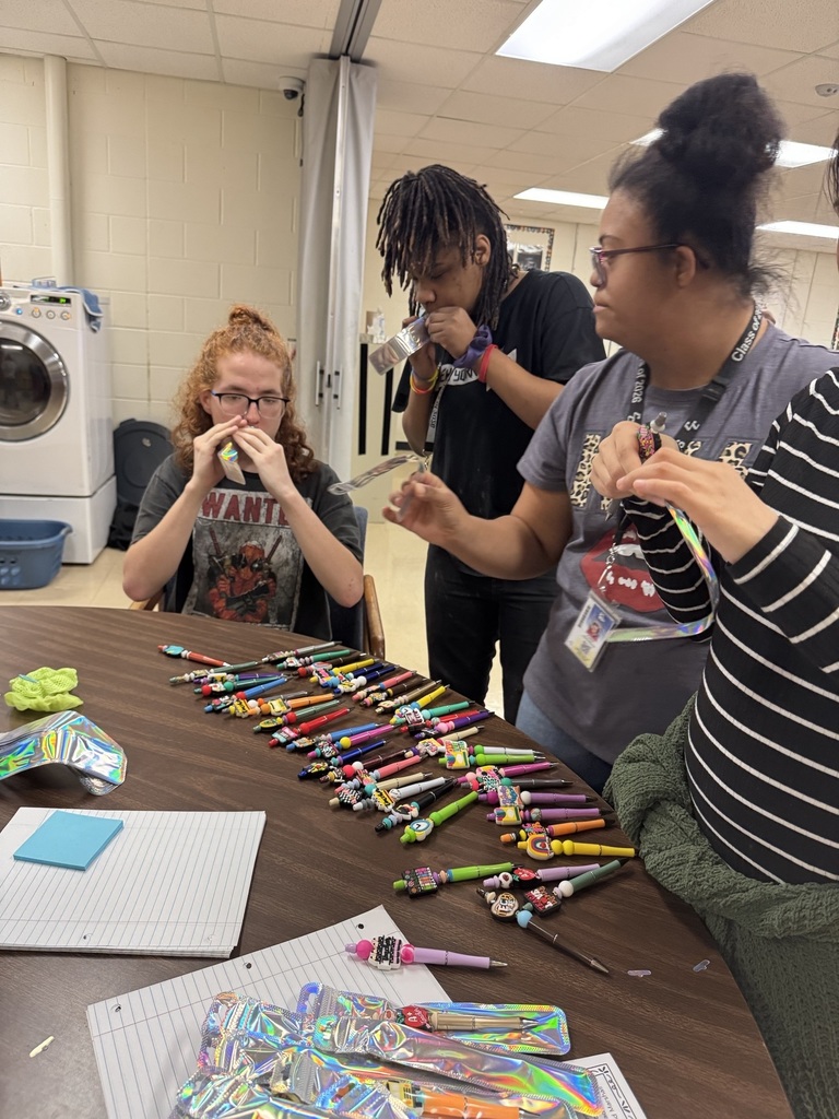 Students prepping and preparing pens to give away to teachers for TEACHER APPRECIATION WEEK