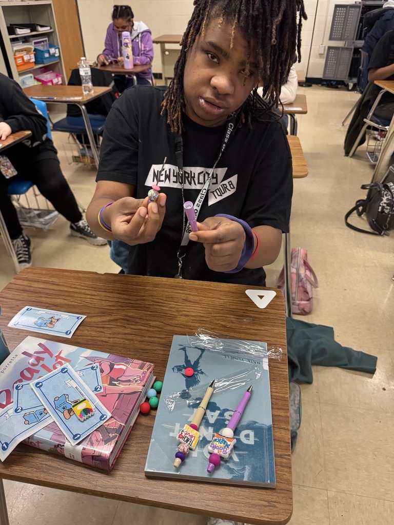 Students prepping and preparing pens to give away to teachers for TEACHER APPRECIATION WEEK