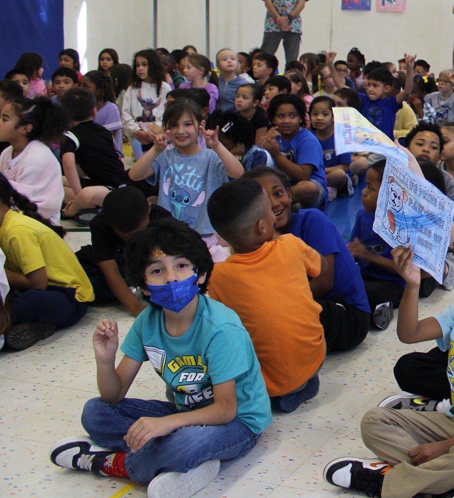 Students sitting line showing bulldawg pride